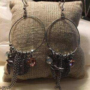 CHARMED earrings. DOVE fly.